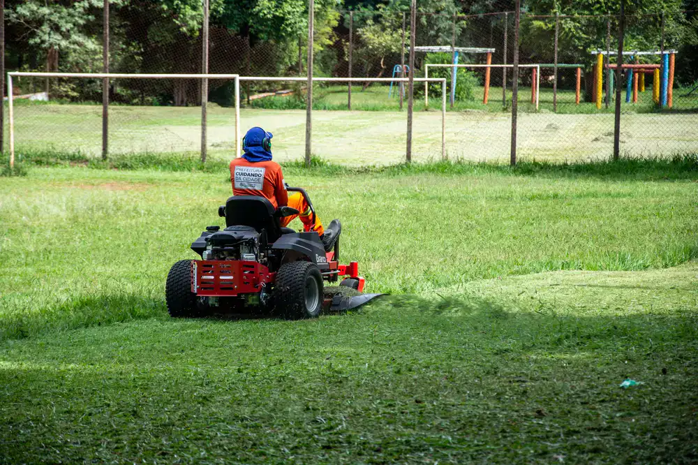 Professional riding mower cutting grass cleanly